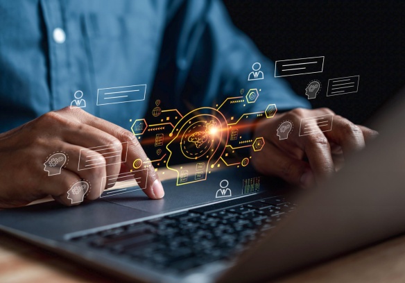 a man is working in front of laptop