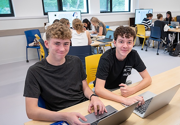Future Global Leaders monitor with high school students at UBC.